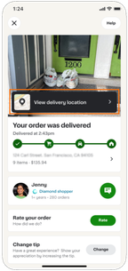 Shows a highlighted "View delivery location" button. Text reads "Your order was delivered" and "Delivered at 2:43pm," with a progress tracker showing all four stages complete.