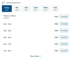 Shows a pickup time selector with a Ready by option and scheduled one-hour time slots.