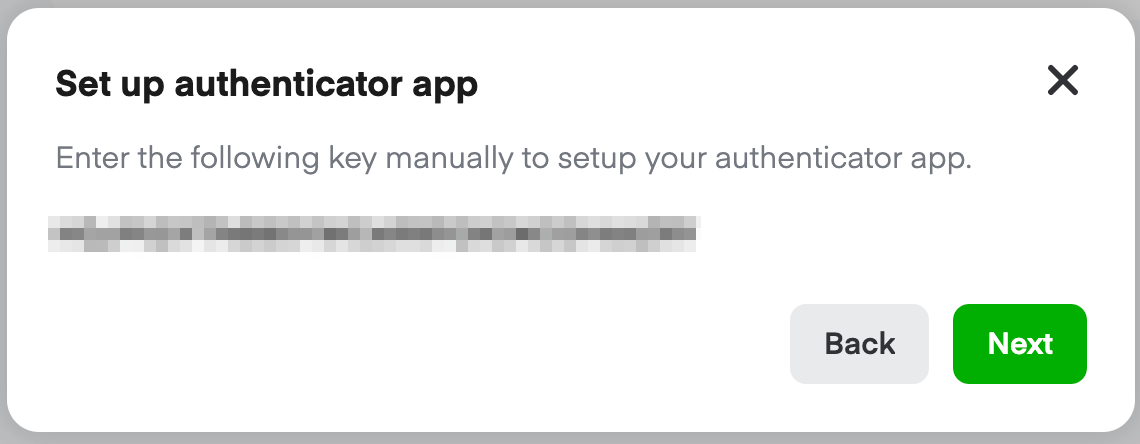 Set up authenticator app dialog with manual key entry field
