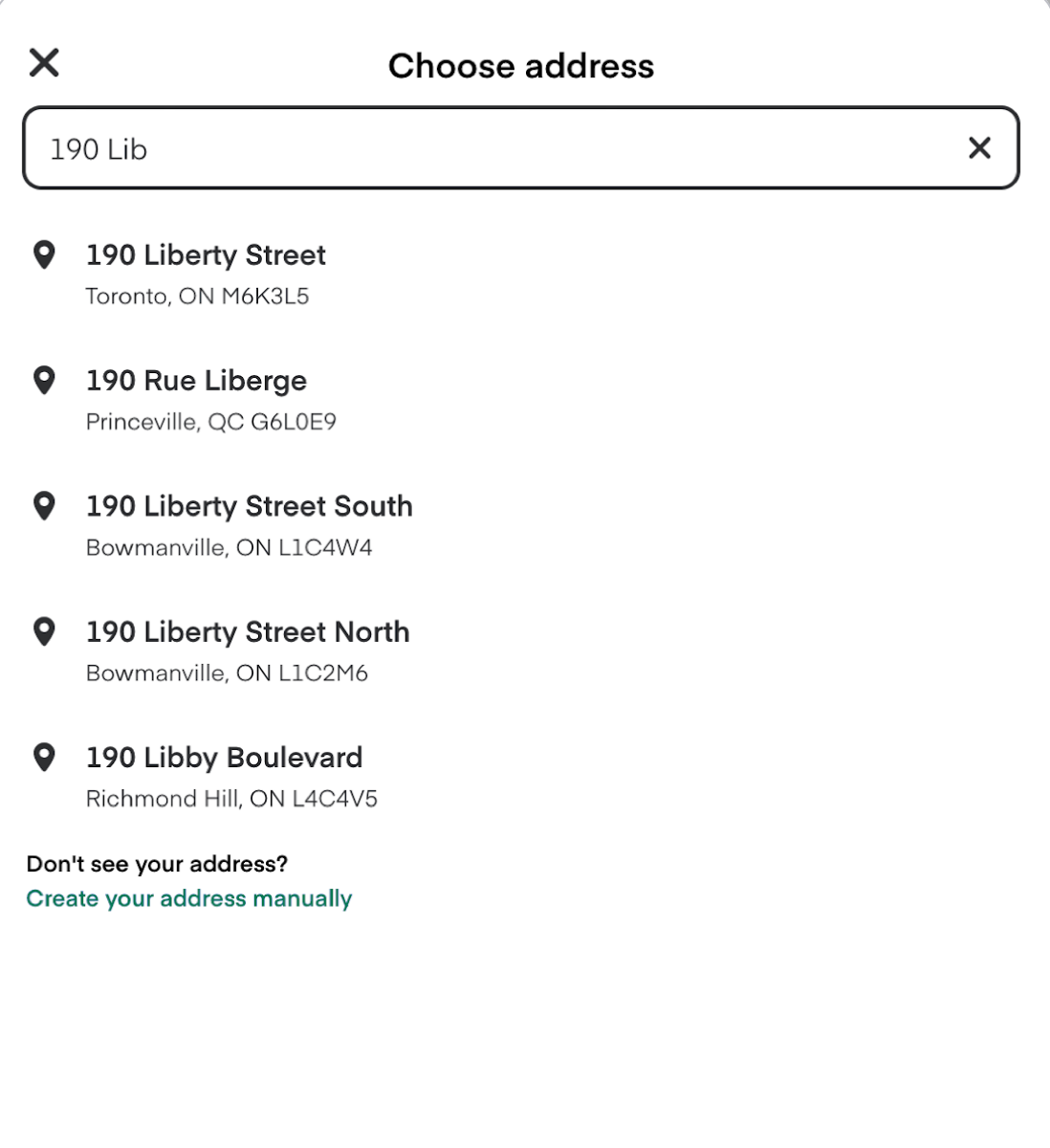 Shows an address selection screen with a search field at the top pre-filled with &quot;190 Lib.&quot; Below, there is a list of suggested addresses with their corresponding cities and postal codes. At the bottom, there is a link to manually create an address if it&#39;s not listed.