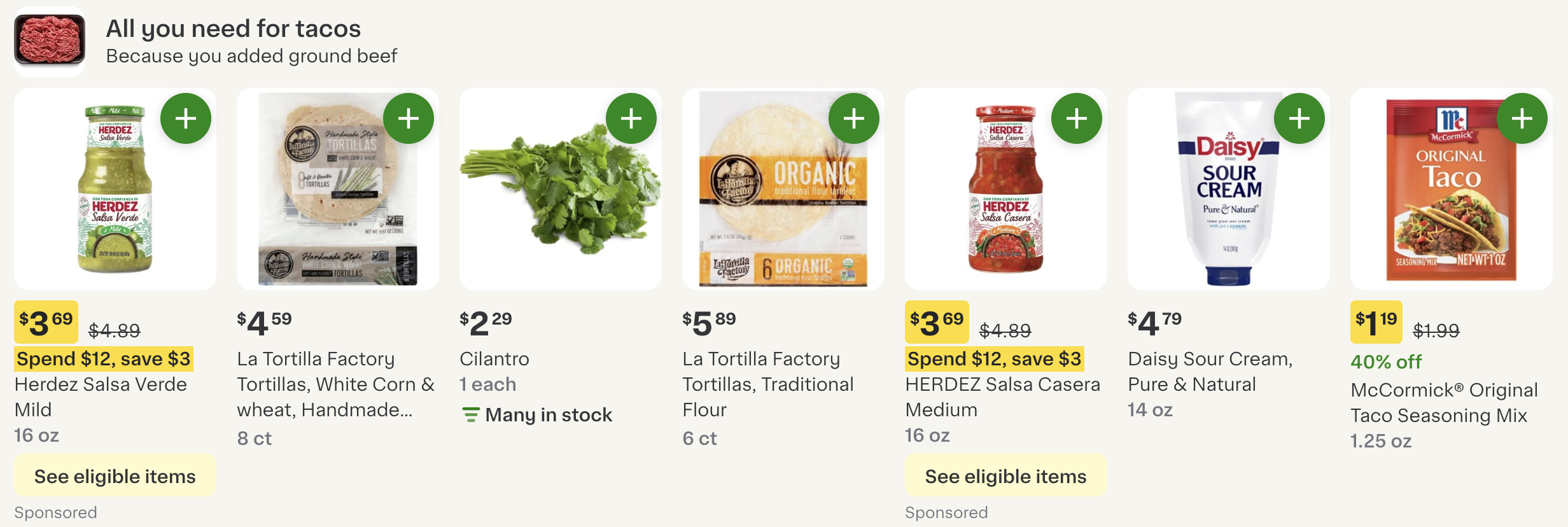Shows a &quot;All you need for tacos&quot; section featuring taco-related items like salsa, tortillas, cilantro, sour cream, and seasoning mix, with prices and discounts highlighted.